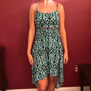 Woman’s aqua tribal high-low dress